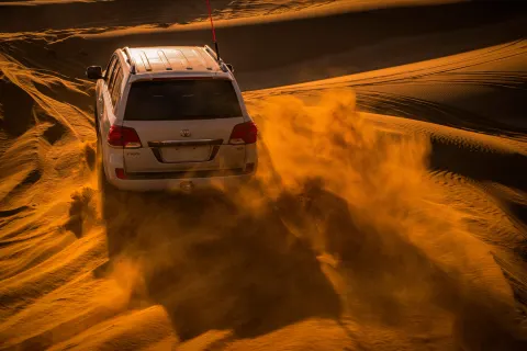 Dubai Desert Safari with Quad Bike, Camel Ride & BBQ Dinner